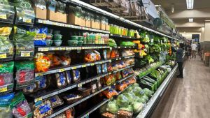 an image of a isle in a grocery store featuring fresh produce
